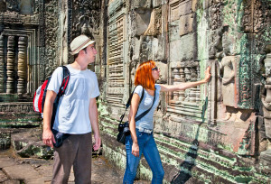 Couple at Angkor Wat temple complex, Cambodia.